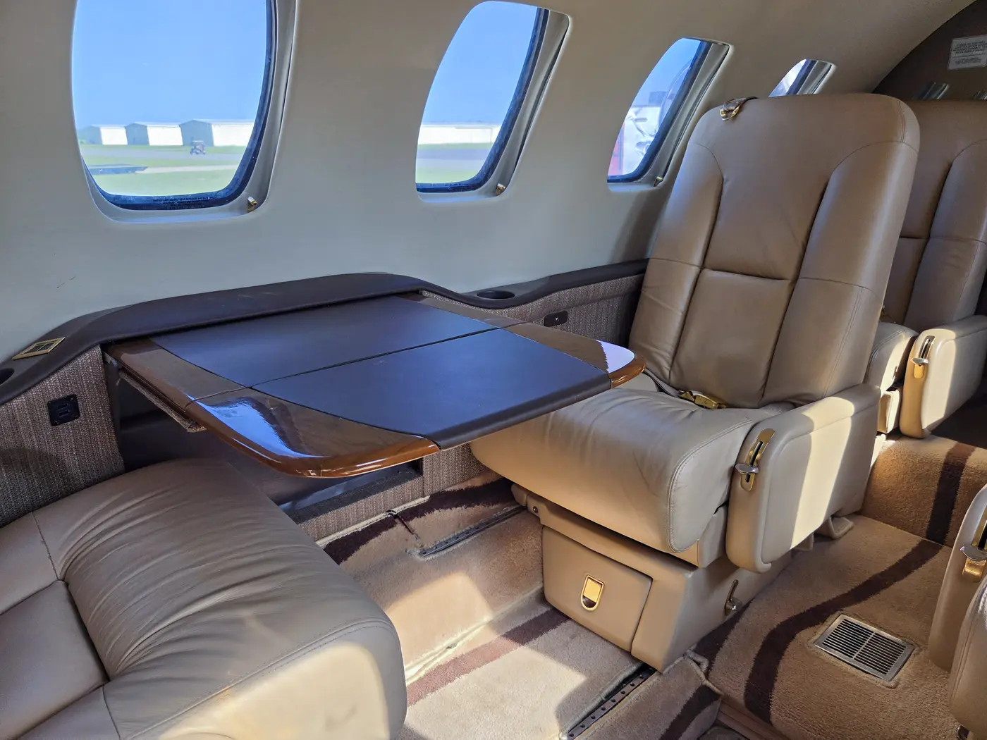Fold-out executive table deployed