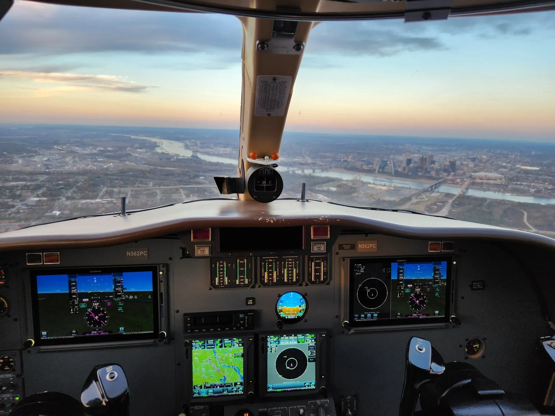 Citation CJ glass cockpit in flight at golden hour
