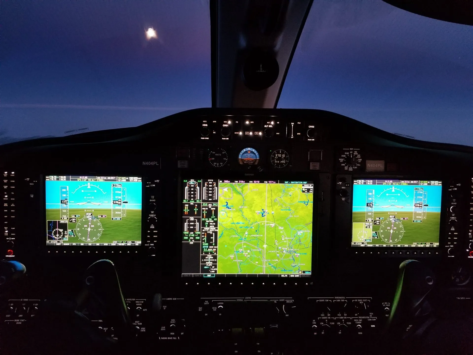 Citation Mustang glass cockpit lit at night