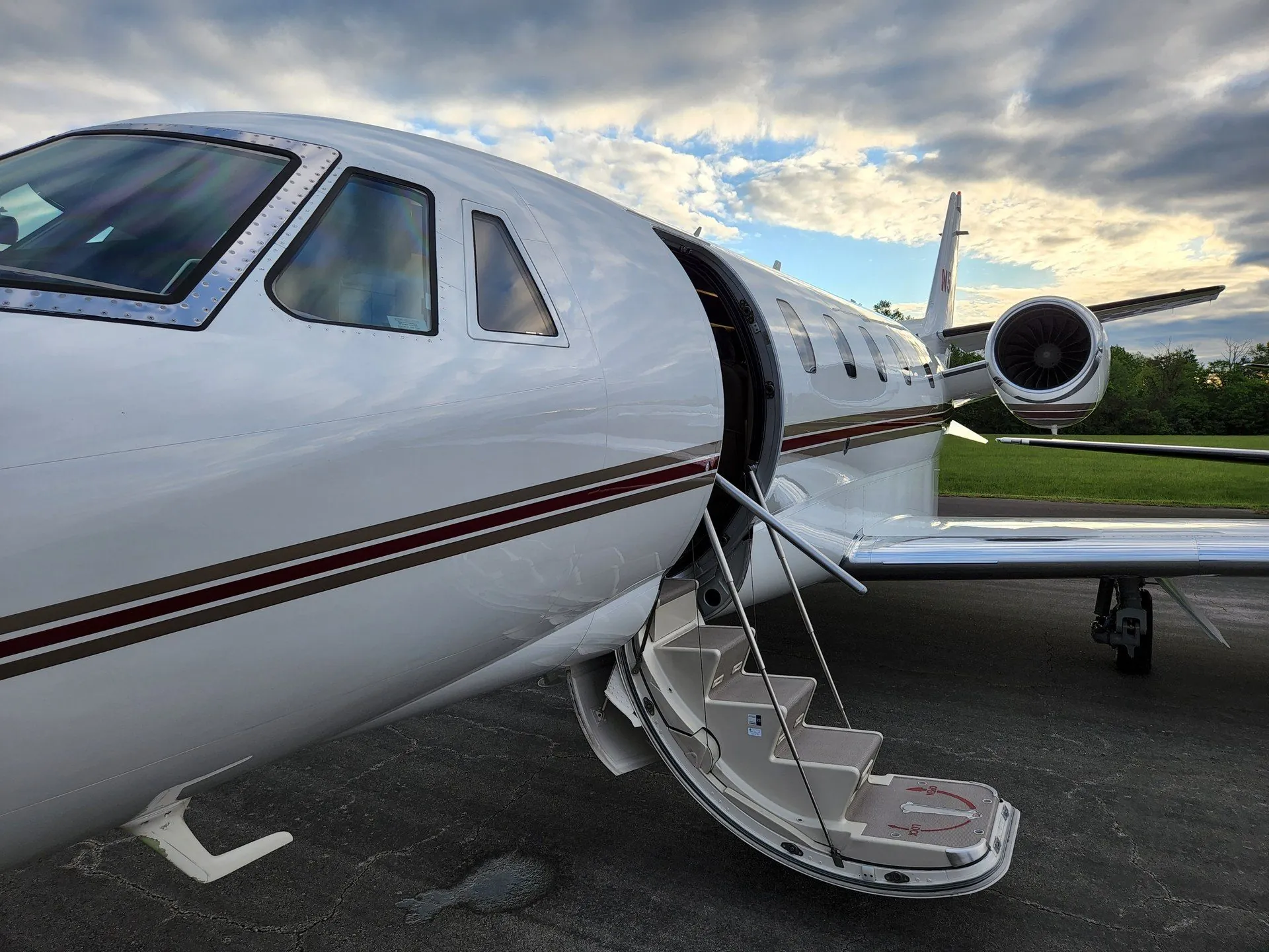 Citation XLS+ exterior with airstair extended at dusk